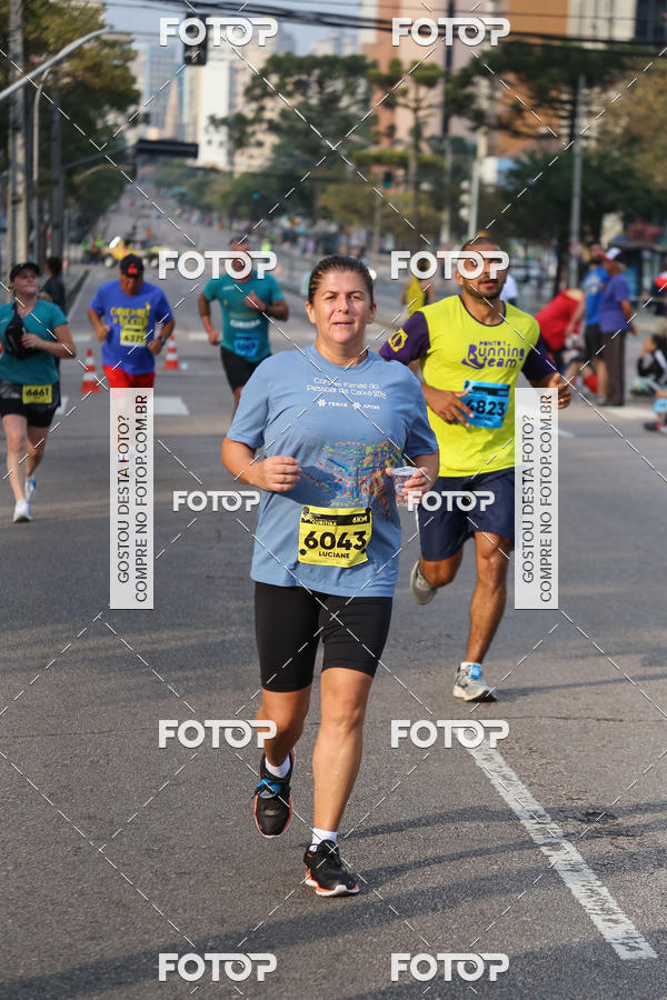 Buy your photos of the eventMeia Maratona Internacional de Curitiba 2018 on Fotop