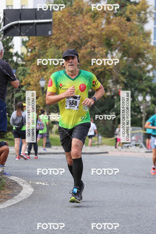 Buy your photos of the eventMeia Maratona Internacional de Curitiba 2018 on Fotop