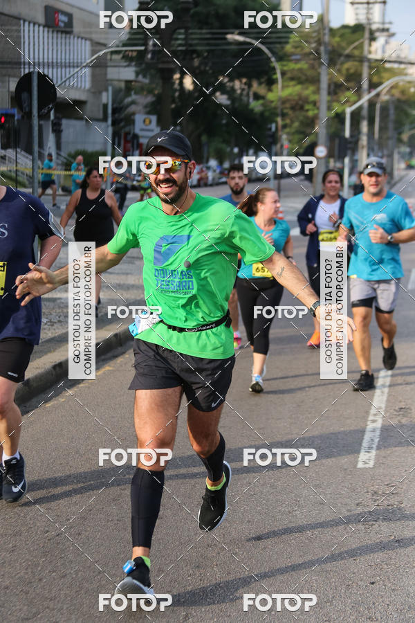 Buy your photos of the eventMeia Maratona Internacional de Curitiba 2018 on Fotop