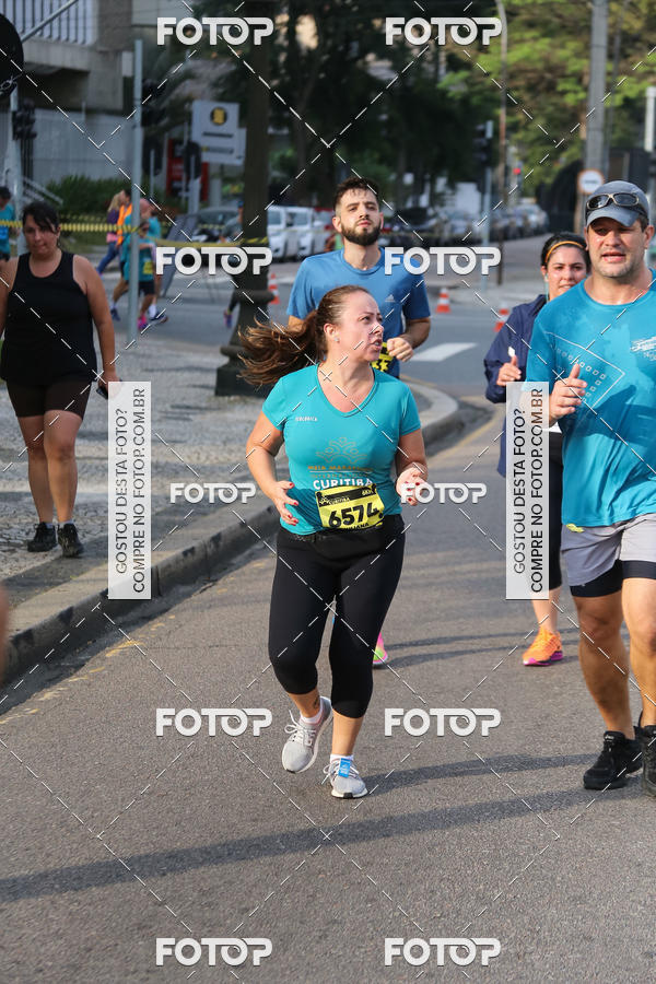 Buy your photos of the eventMeia Maratona Internacional de Curitiba 2018 on Fotop