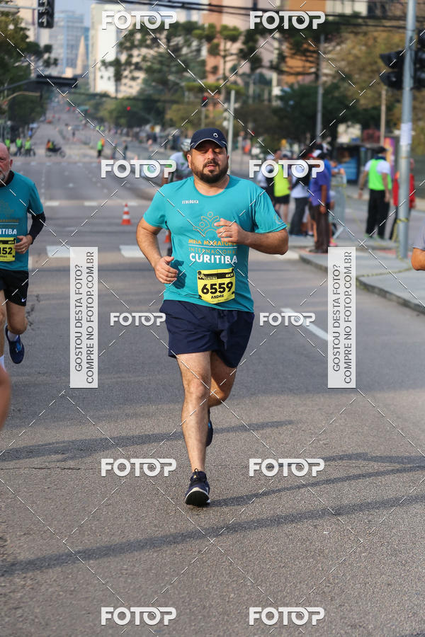 Buy your photos of the eventMeia Maratona Internacional de Curitiba 2018 on Fotop