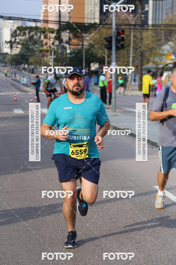 Buy your photos of the eventMeia Maratona Internacional de Curitiba 2018 on Fotop