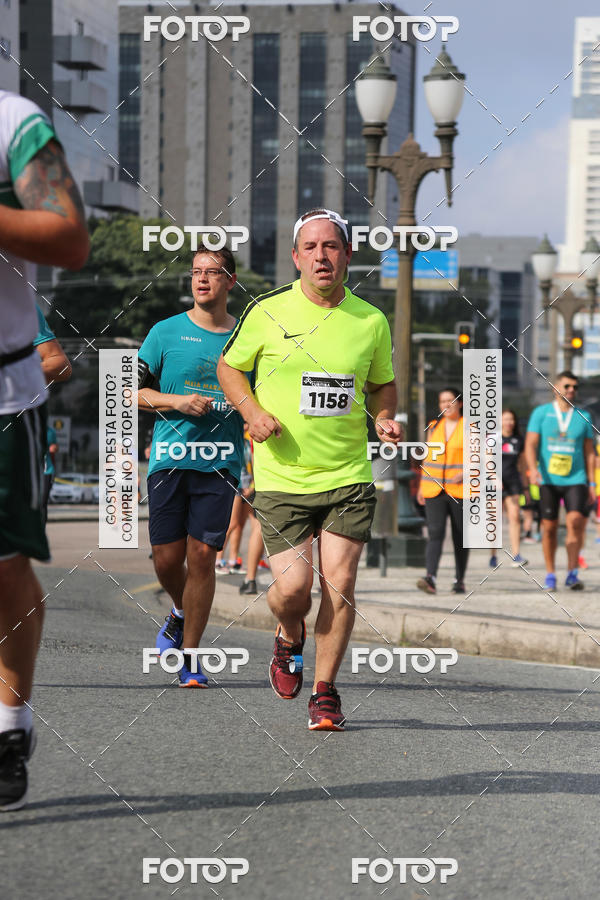 Buy your photos of the eventMeia Maratona Internacional de Curitiba 2018 on Fotop