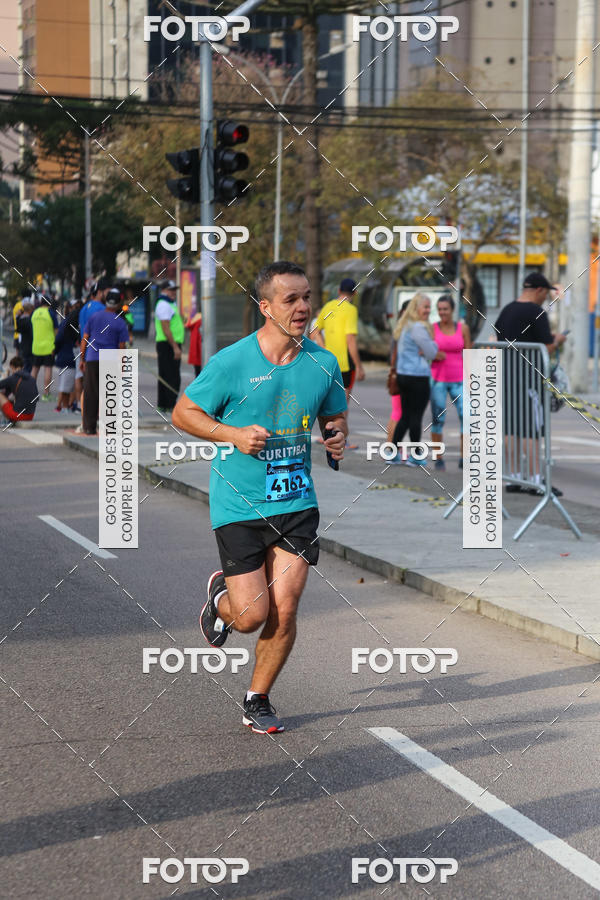Buy your photos of the eventMeia Maratona Internacional de Curitiba 2018 on Fotop