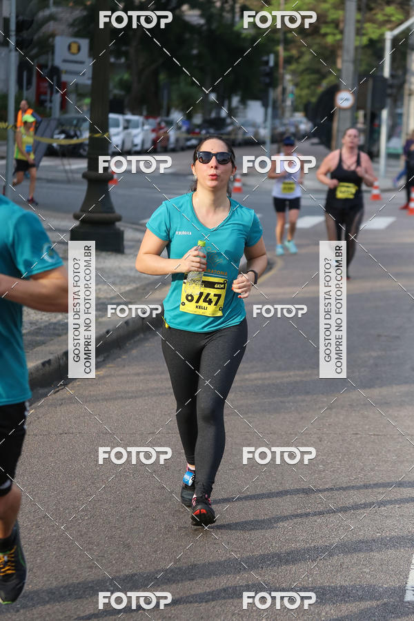 Buy your photos of the eventMeia Maratona Internacional de Curitiba 2018 on Fotop