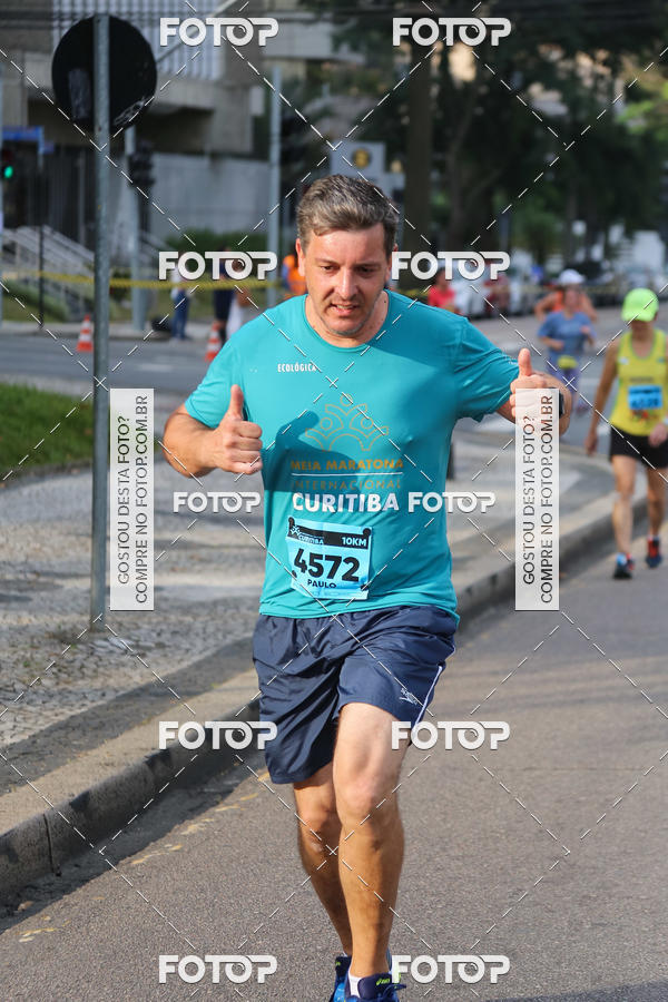 Buy your photos of the eventMeia Maratona Internacional de Curitiba 2018 on Fotop