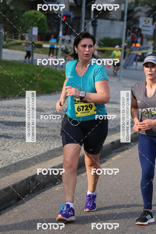 Buy your photos of the eventMeia Maratona Internacional de Curitiba 2018 on Fotop
