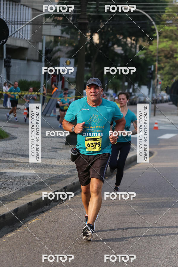 Buy your photos of the eventMeia Maratona Internacional de Curitiba 2018 on Fotop