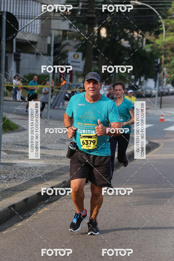 Buy your photos of the eventMeia Maratona Internacional de Curitiba 2018 on Fotop