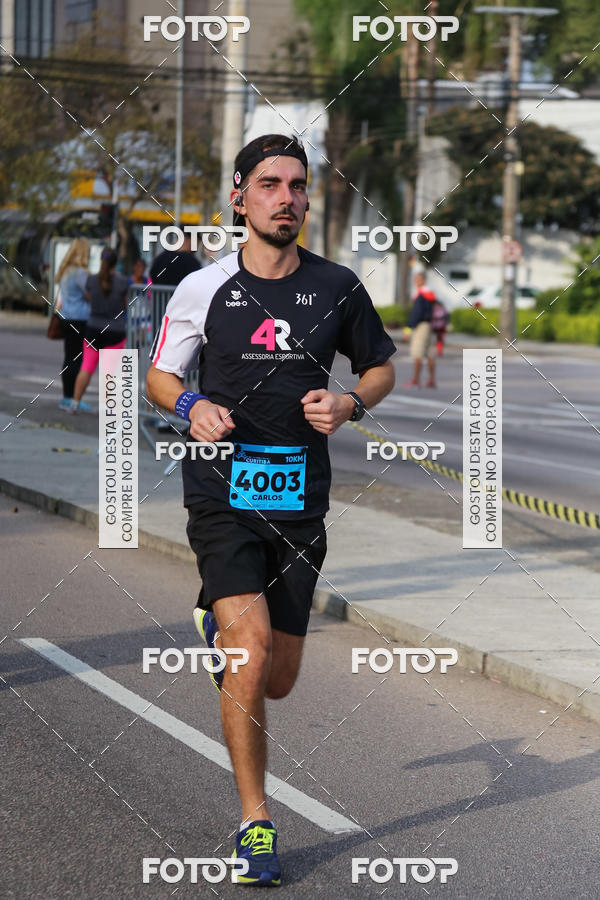 Buy your photos of the eventMeia Maratona Internacional de Curitiba 2018 on Fotop