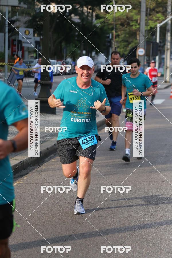 Buy your photos of the eventMeia Maratona Internacional de Curitiba 2018 on Fotop
