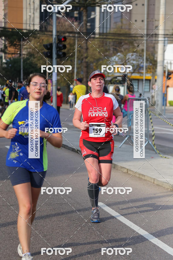 Buy your photos of the eventMeia Maratona Internacional de Curitiba 2018 on Fotop