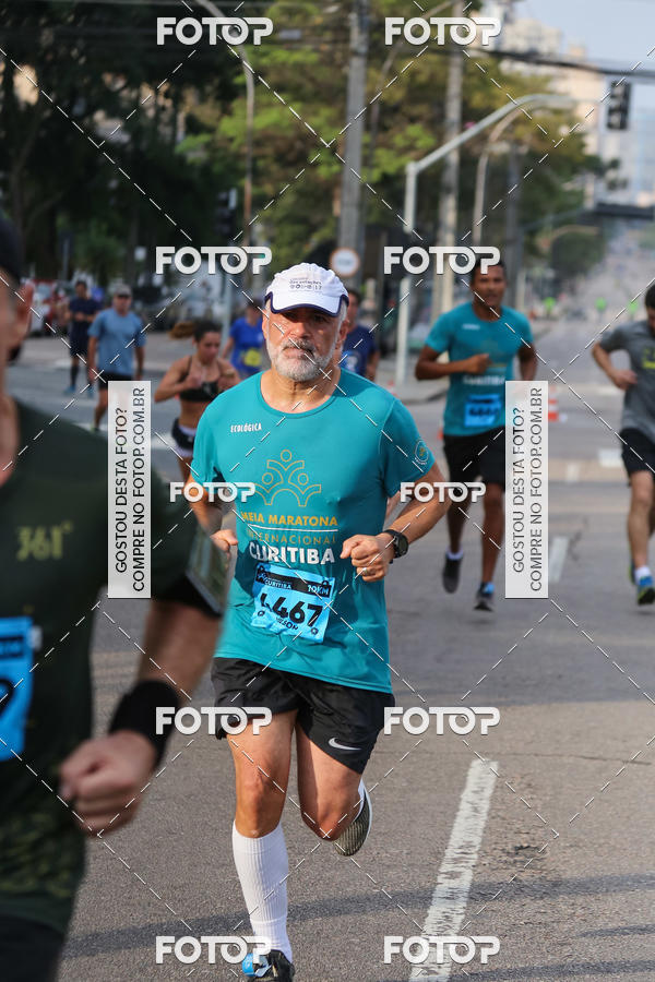 Buy your photos of the eventMeia Maratona Internacional de Curitiba 2018 on Fotop