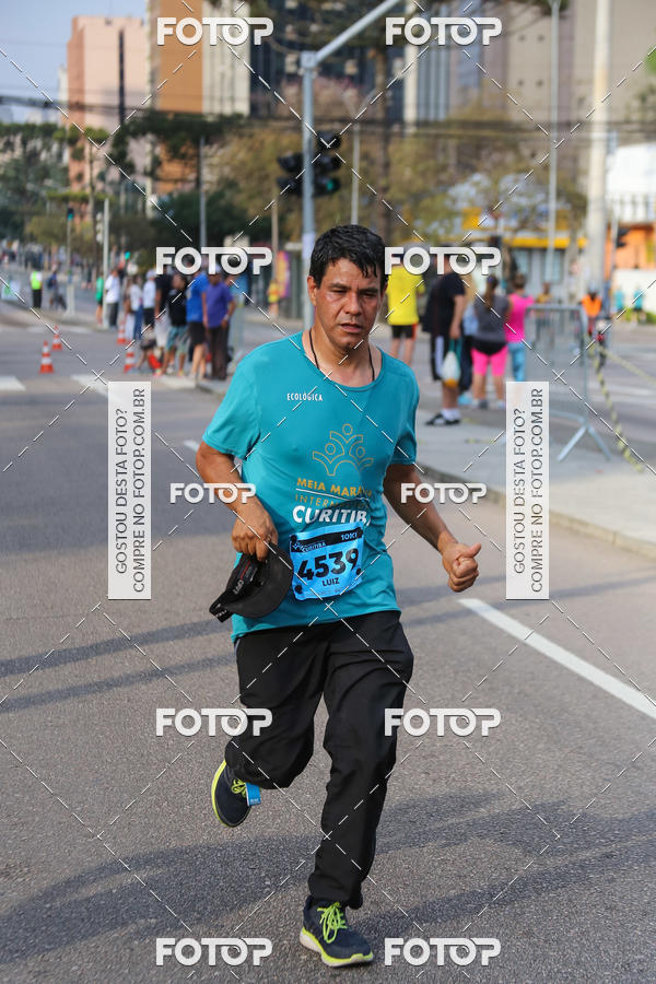 Buy your photos of the eventMeia Maratona Internacional de Curitiba 2018 on Fotop