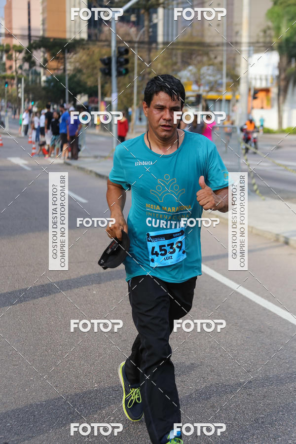 Buy your photos of the eventMeia Maratona Internacional de Curitiba 2018 on Fotop