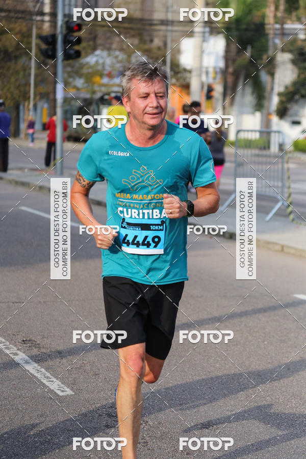 Buy your photos of the eventMeia Maratona Internacional de Curitiba 2018 on Fotop