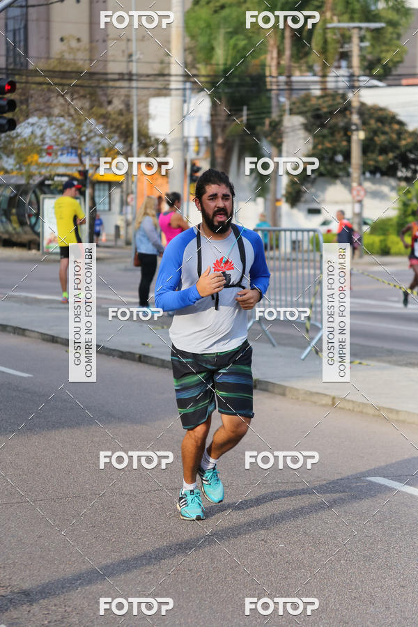 Buy your photos of the eventMeia Maratona Internacional de Curitiba 2018 on Fotop