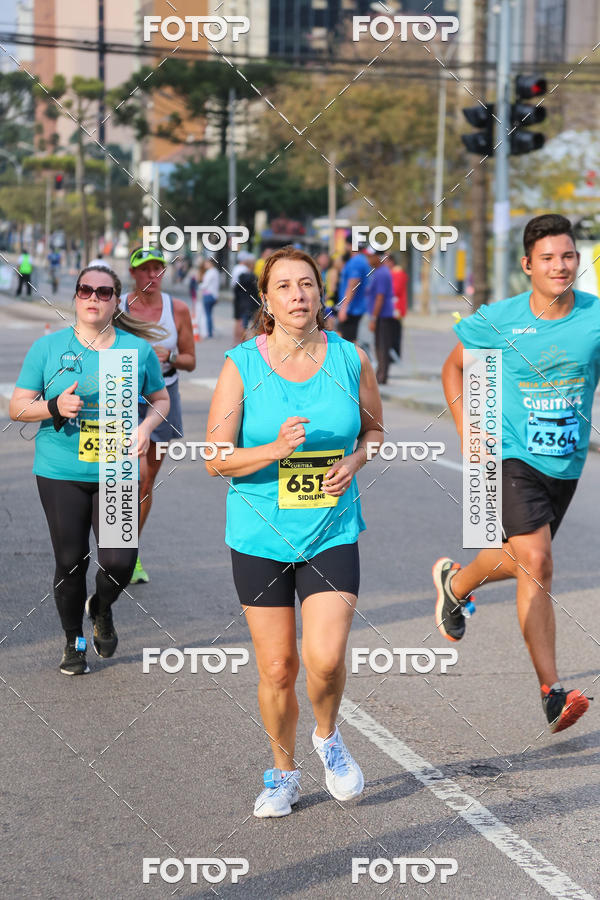 Buy your photos of the eventMeia Maratona Internacional de Curitiba 2018 on Fotop