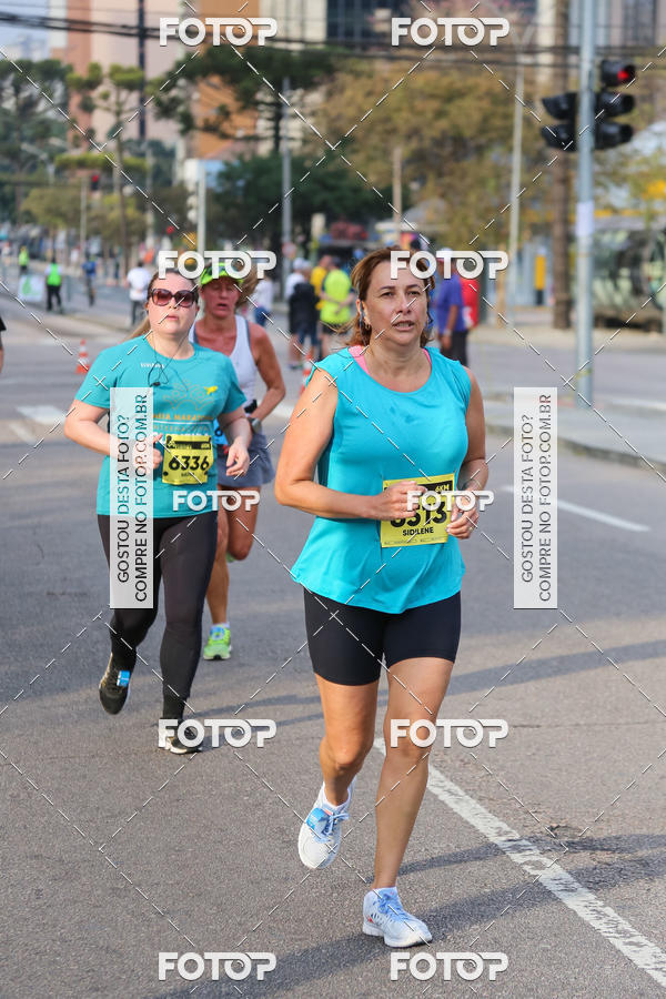 Buy your photos of the eventMeia Maratona Internacional de Curitiba 2018 on Fotop