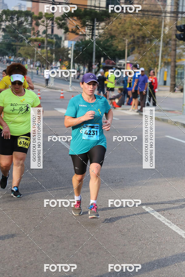 Buy your photos of the eventMeia Maratona Internacional de Curitiba 2018 on Fotop