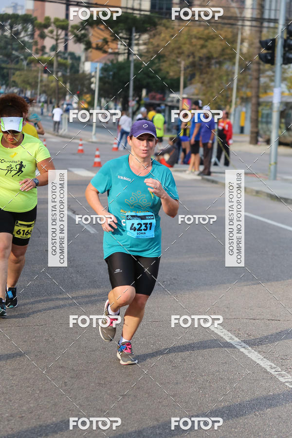 Buy your photos of the eventMeia Maratona Internacional de Curitiba 2018 on Fotop