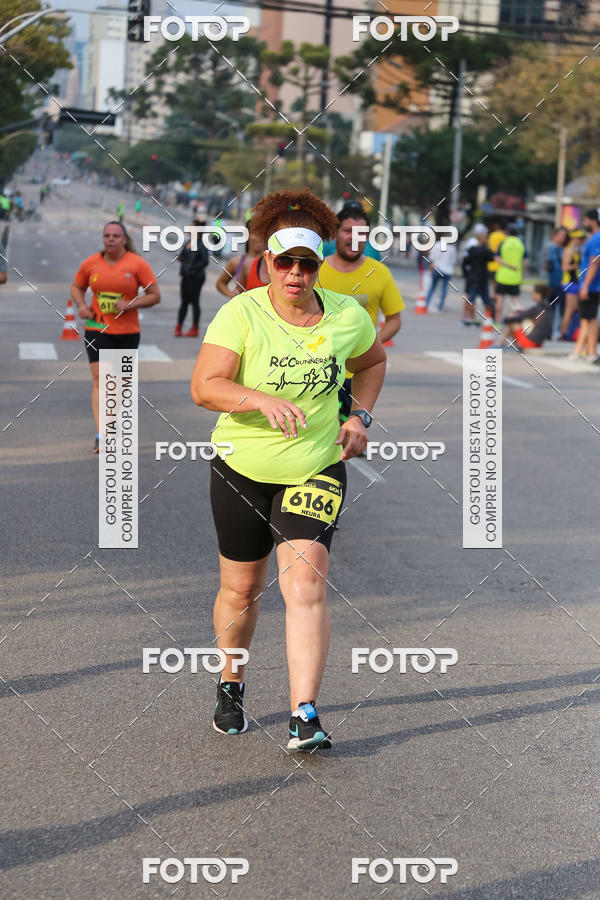 Buy your photos of the eventMeia Maratona Internacional de Curitiba 2018 on Fotop
