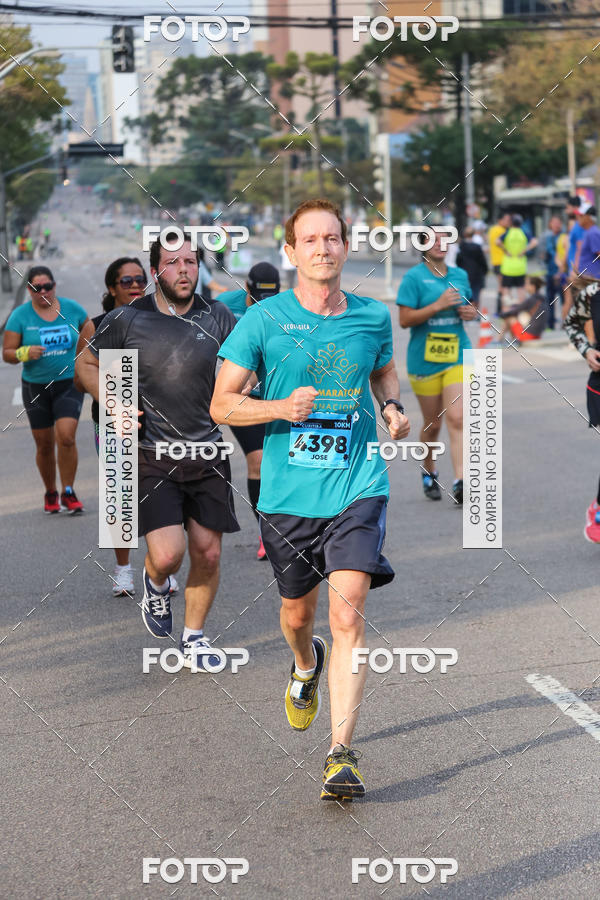 Buy your photos of the eventMeia Maratona Internacional de Curitiba 2018 on Fotop