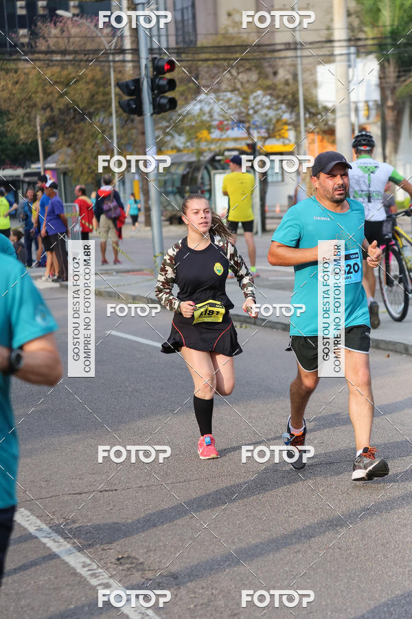 Buy your photos of the eventMeia Maratona Internacional de Curitiba 2018 on Fotop