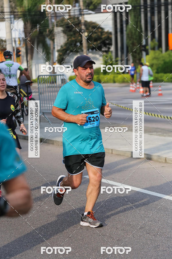 Buy your photos of the eventMeia Maratona Internacional de Curitiba 2018 on Fotop