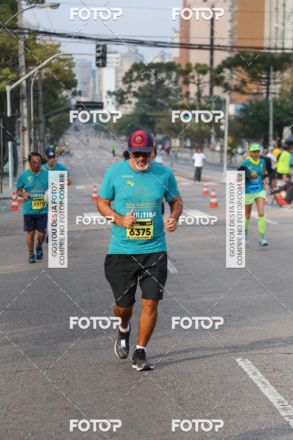 Buy your photos of the eventMeia Maratona Internacional de Curitiba 2018 on Fotop