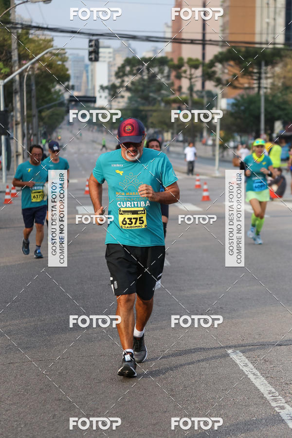 Buy your photos of the eventMeia Maratona Internacional de Curitiba 2018 on Fotop