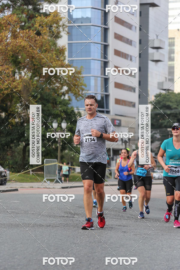 Buy your photos of the eventMeia Maratona Internacional de Curitiba 2018 on Fotop