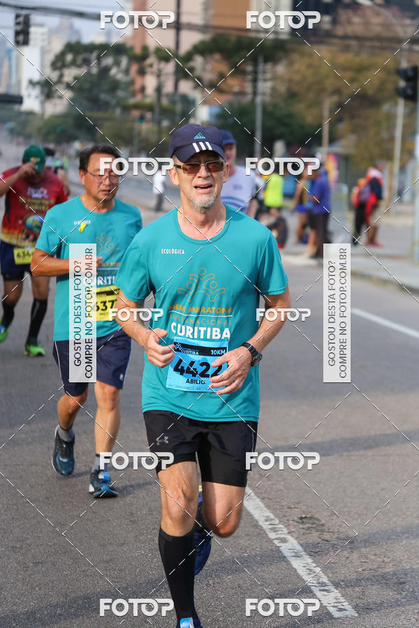 Buy your photos of the eventMeia Maratona Internacional de Curitiba 2018 on Fotop