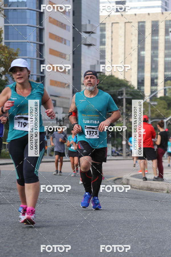 Buy your photos of the eventMeia Maratona Internacional de Curitiba 2018 on Fotop