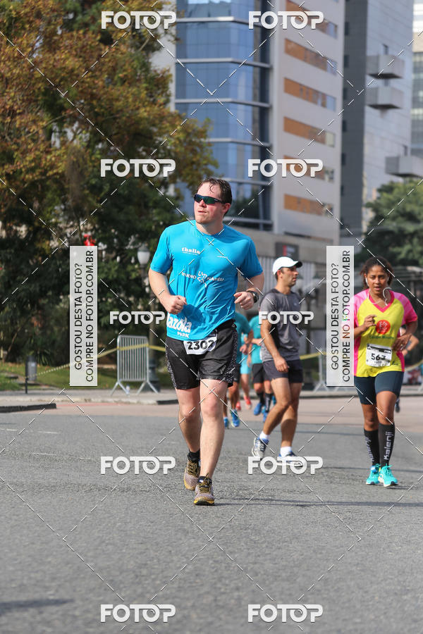 Buy your photos of the eventMeia Maratona Internacional de Curitiba 2018 on Fotop
