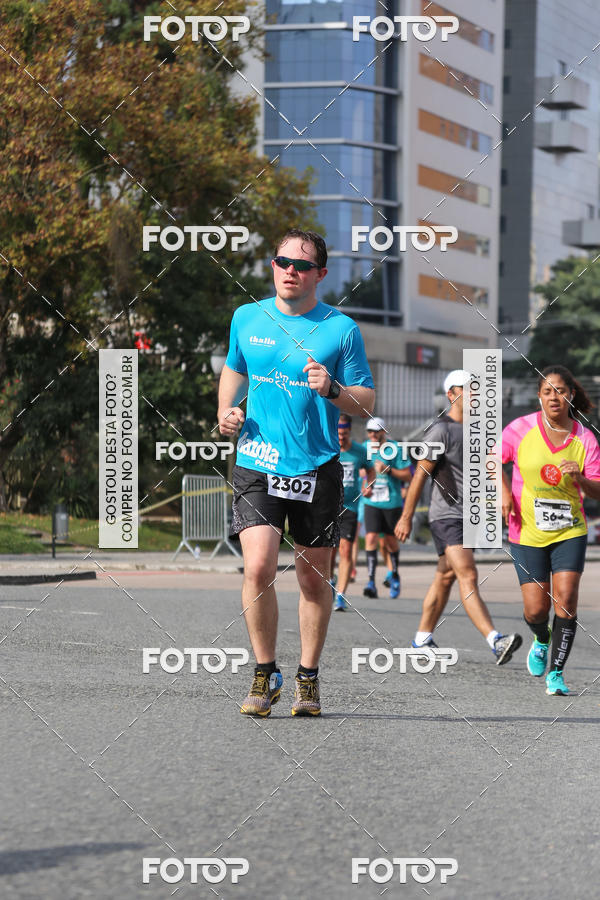 Buy your photos of the eventMeia Maratona Internacional de Curitiba 2018 on Fotop