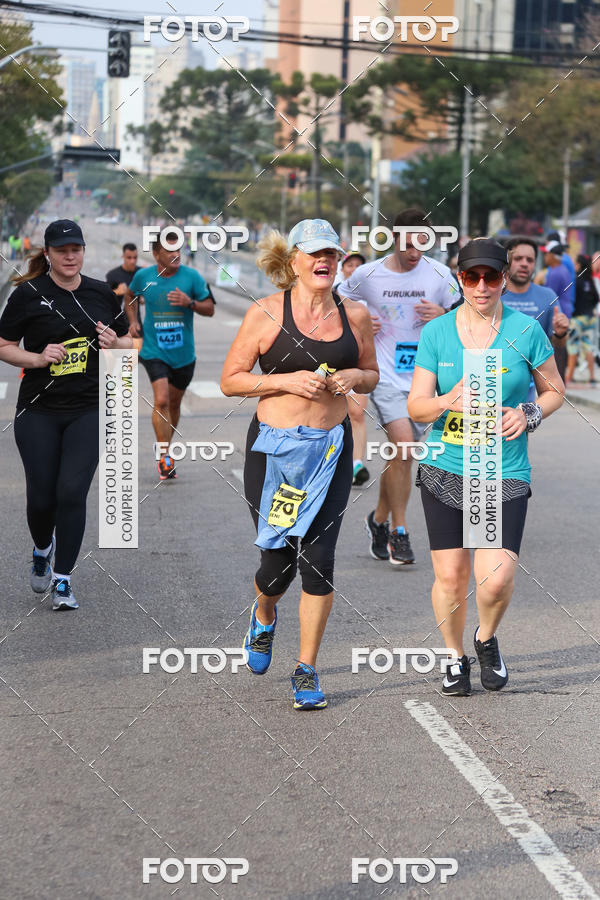 Buy your photos of the eventMeia Maratona Internacional de Curitiba 2018 on Fotop