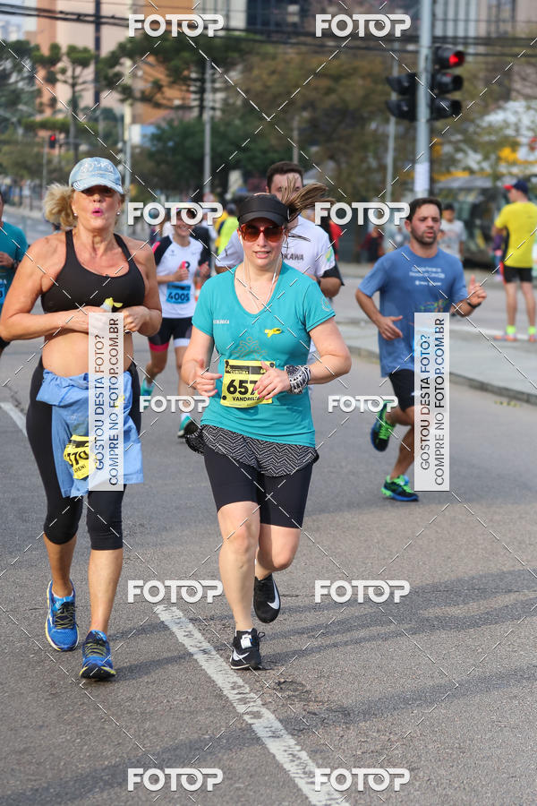 Buy your photos of the eventMeia Maratona Internacional de Curitiba 2018 on Fotop