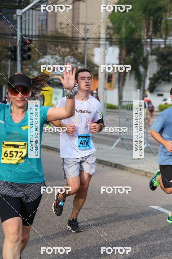 Buy your photos of the eventMeia Maratona Internacional de Curitiba 2018 on Fotop