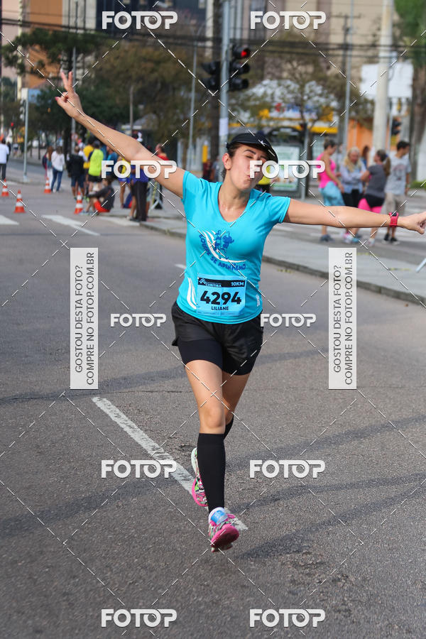 Buy your photos of the eventMeia Maratona Internacional de Curitiba 2018 on Fotop