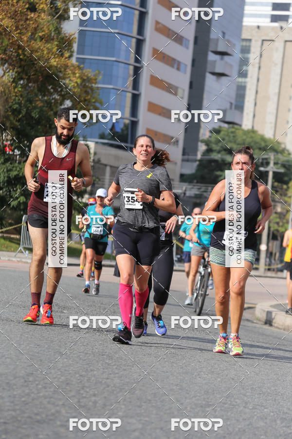 Buy your photos of the eventMeia Maratona Internacional de Curitiba 2018 on Fotop