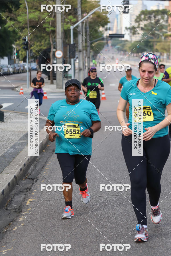 Buy your photos of the eventMeia Maratona Internacional de Curitiba 2018 on Fotop