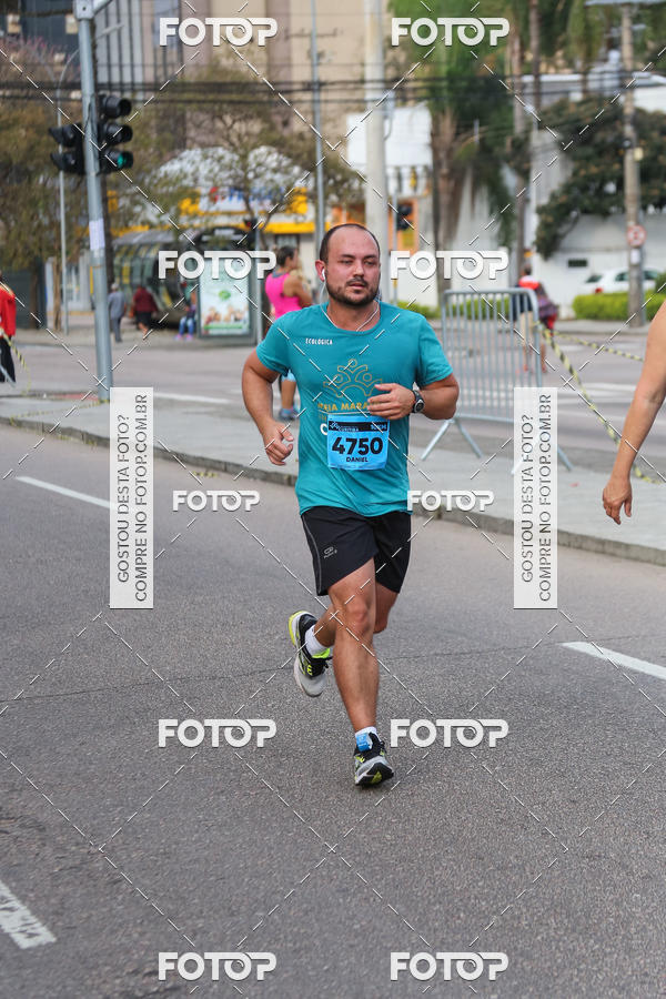 Buy your photos of the eventMeia Maratona Internacional de Curitiba 2018 on Fotop