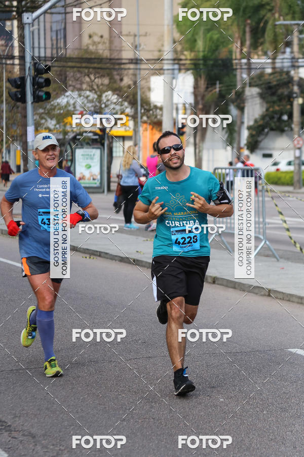 Buy your photos of the eventMeia Maratona Internacional de Curitiba 2018 on Fotop