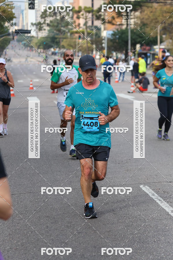Buy your photos of the eventMeia Maratona Internacional de Curitiba 2018 on Fotop