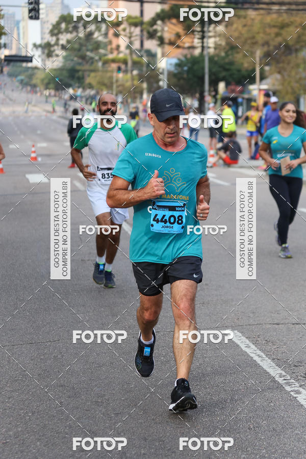 Buy your photos of the eventMeia Maratona Internacional de Curitiba 2018 on Fotop