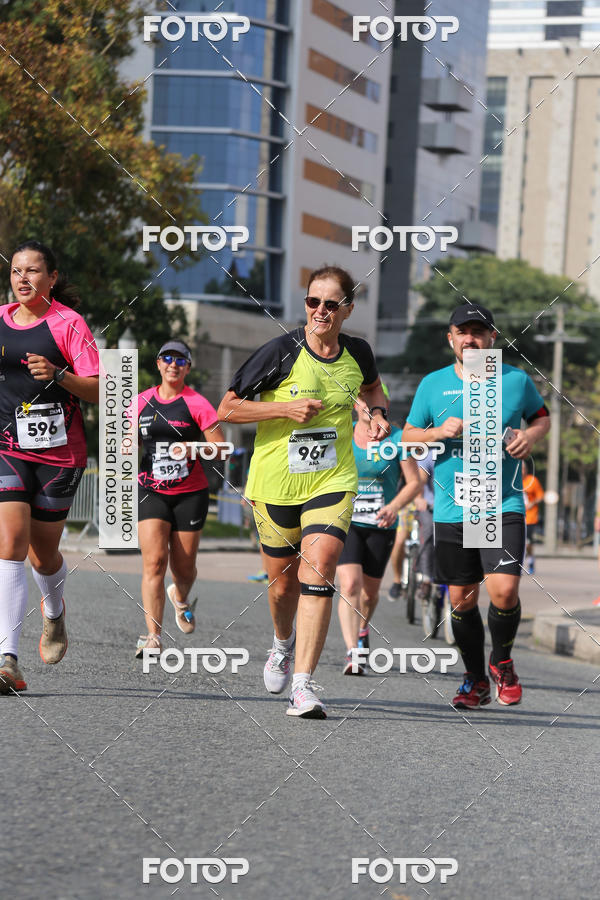 Buy your photos of the eventMeia Maratona Internacional de Curitiba 2018 on Fotop