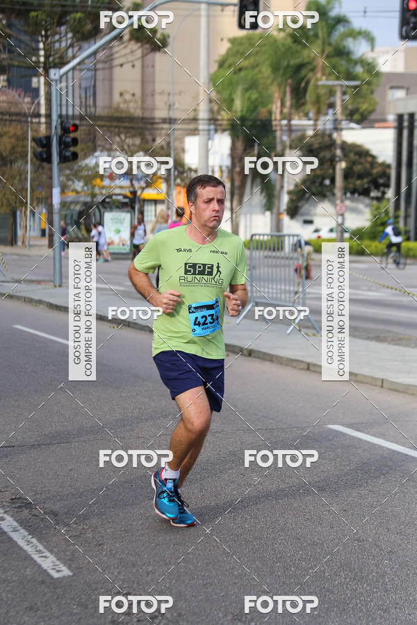 Buy your photos of the eventMeia Maratona Internacional de Curitiba 2018 on Fotop
