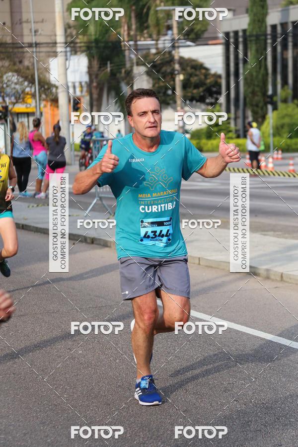 Buy your photos of the eventMeia Maratona Internacional de Curitiba 2018 on Fotop