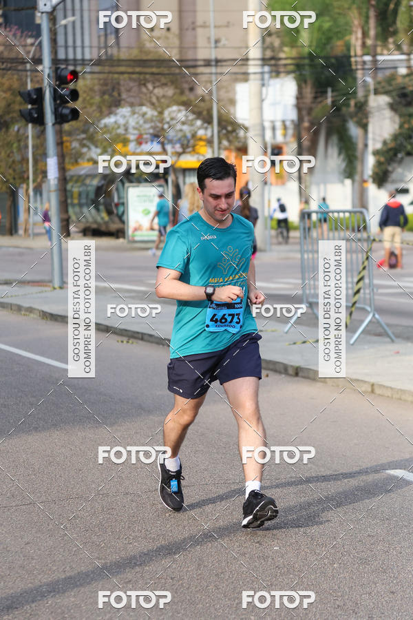 Buy your photos of the eventMeia Maratona Internacional de Curitiba 2018 on Fotop